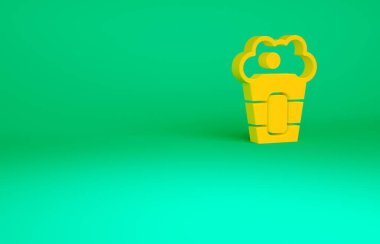 Yeşil arka planda izole edilmiş karton kutuda turuncu patlamış mısır. Patlamış mısır kutusu. Minimalizm kavramı. 3d illüstrasyon 3B canlandırma