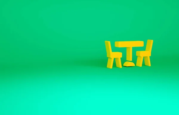 Mesa de piquenique laranja com cadeiras em ambos os lados do ícone da mesa isolada no fundo verde. Conceito de minimalismo. 3D ilustração 3D render — Fotografia de Stock