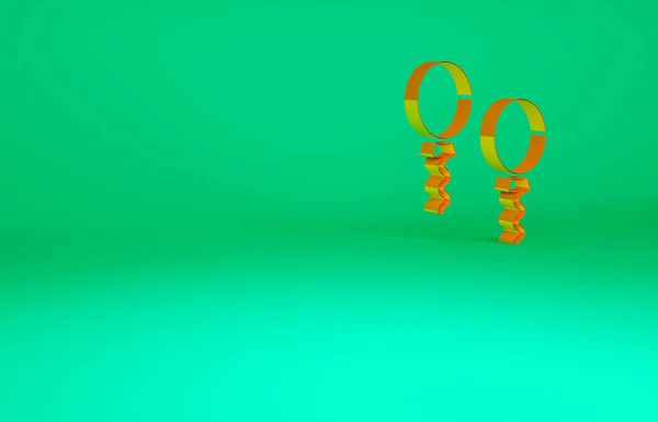 Апельсиновые шарики с иконкой ленты изолированы на зеленом фоне. Концепция минимализма. 3D-рендеринг — стоковое фото