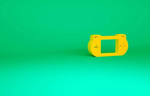 Orange bärbara videospel konsol ikon isolerad på grön bakgrund. Gamepadskylt. Spelkoncept. Minimalistiskt koncept. 3D-återgivning för 3D — Stockfoto