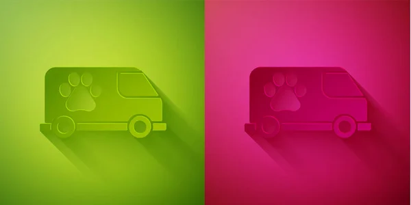 Paper cut Veterinary ambulance icon isolated on green and pink background. Veterinary clinic symbol. Paper art style. Vector.