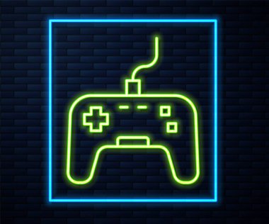 Parlayan neon hattı Gamepad simgesi tuğla duvar arka planında izole edildi. Oyun kontrolörü. Vektör.