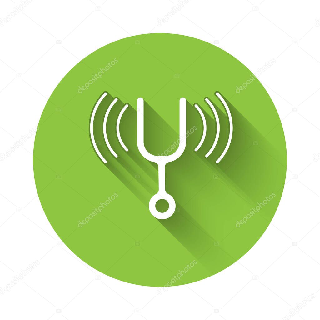 White Musical tuning fork for tuning musical instruments icon isolated with long shadow. Green circle button. Vector.