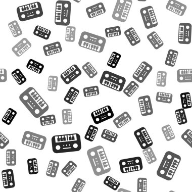 Siyah oyuncak piyano ikonu beyaz arkaplanda izole edilmiş kusursuz desen. Çocuk oyuncağı. Vektör.