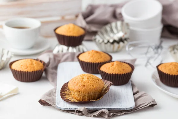 mini cupcakes in paper forms, closeup