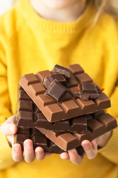 Close Girl Hands Holding Black Milk Chocolate Bars — Stock Photo, Image