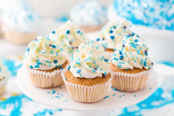 mini cupcakes with cream, closeup