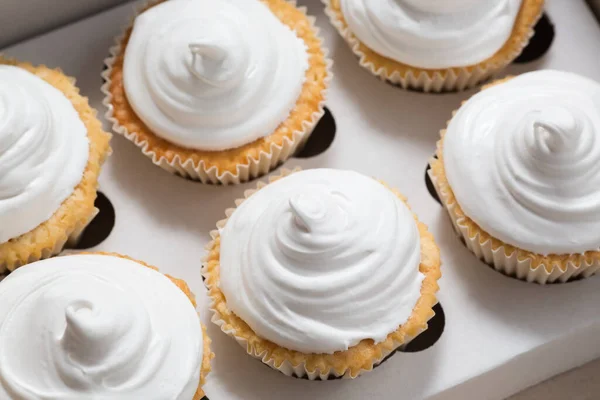mini cupcakes with cream, closeup