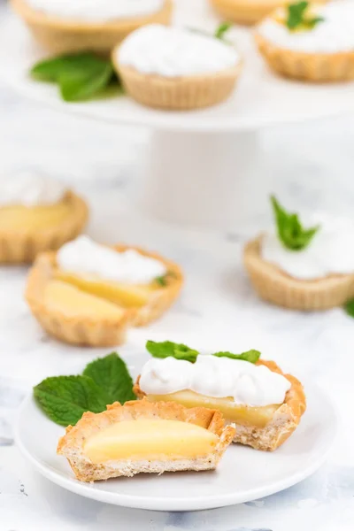 fresh baked pear tartlets with cream cheese and mint