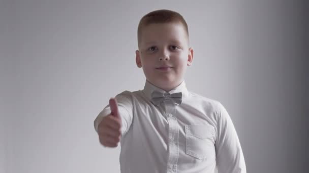 Cheerful Boy Smiling Showing Dislike — Stock Video