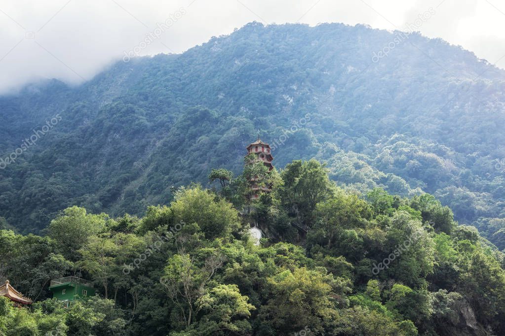 Taroko Tianxiang Scenic area with pagoda and surrounding mountains. Located in Taroko National Park in Taiwan