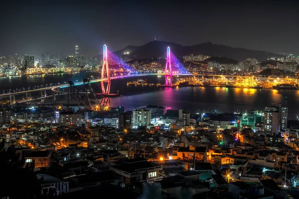 Busan harbor bridge is one of famous bridges in south korea. Connecting Yeongdo and Nam district, the bridge lits up at night in different colors. Taken in Busan, South Korea