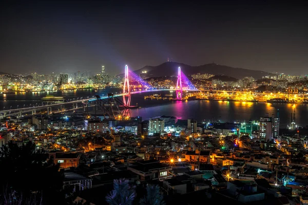 Busan harbor bridge is one of famous bridges in south korea. Connecting Yeongdo and Nam district, the bridge lits up at night in different colors. Taken in Busan, South Korea