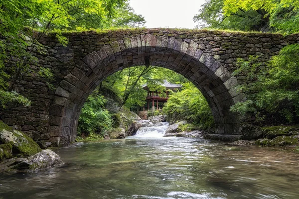 Seungseongyo bridge and the famous Korean pavilion over the creek water. Taken in Seonamsa temple, Suncheon, South Korea