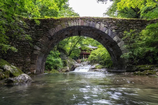 Seungseongyo bridge and the famous Korean pavilion over the creek water. Taken in Seonamsa temple, Suncheon, South Korea