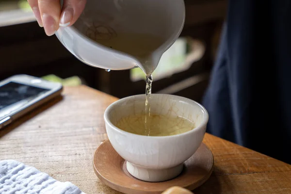 Woman Pouring Tea Teacup — Stock Photo, Image