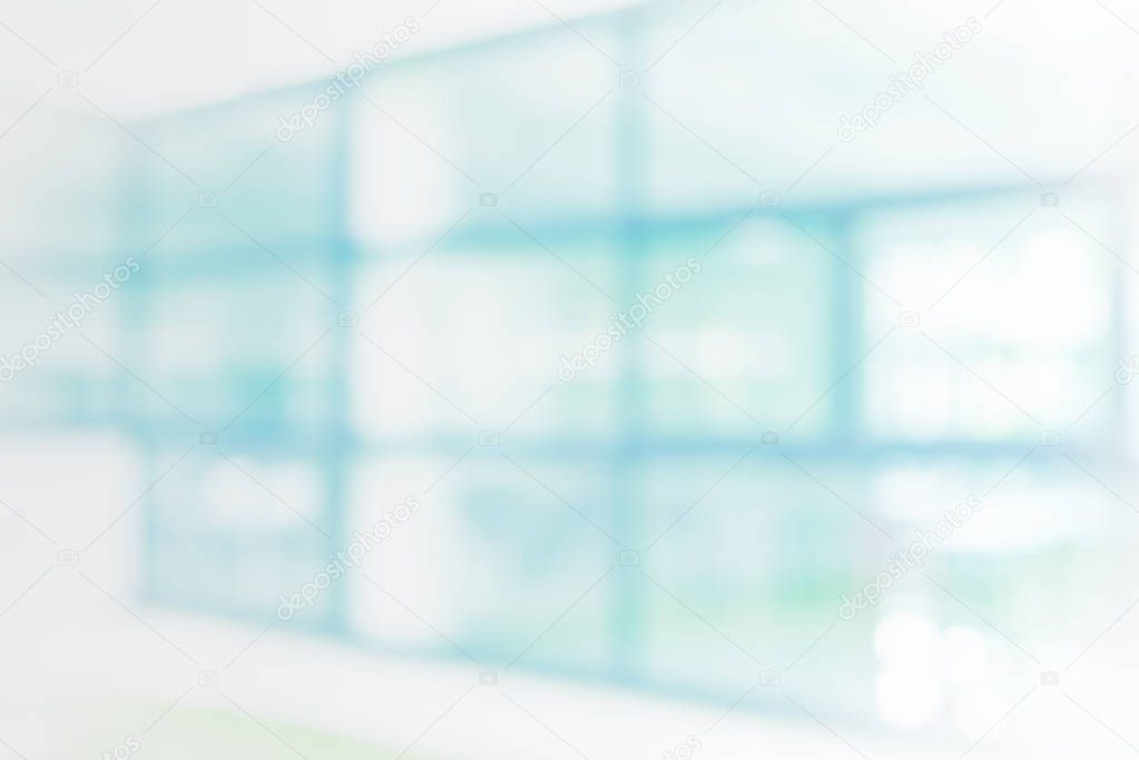 Abstract blur image of office window and door with bokeh in Bright and clean tone for background usage.