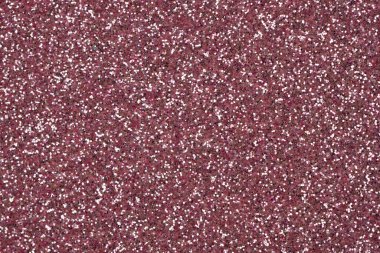 Yumuşak pembe bir arka planda pembe doku dokusu olan bulanık bir desen.