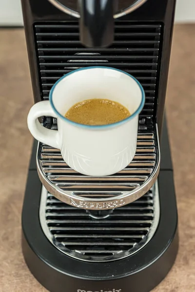 Bayonne, France. 23.06.2020. Coffee Espresso preparing from Nespresso Coffee Machine. Closeup, technology background. — Stock Photo, Image