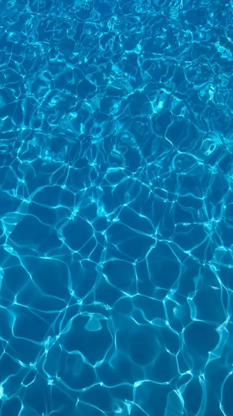 Swimming pool texture water in abstract style on a light background. — Stock Photo, Image