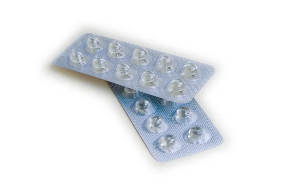 Tablets and pills in a blister, standard of small tablets in a package — Stock Photo, Image