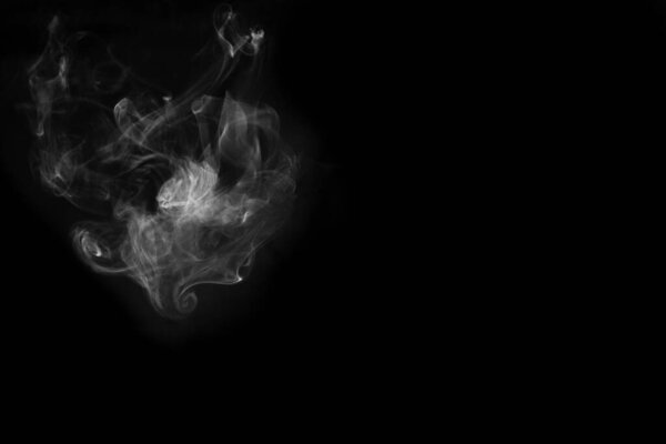 White smoke isolated on black background. smoke stock image.