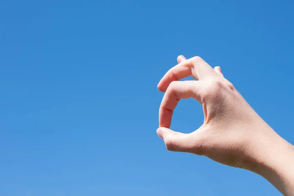 Closeup Gesture Woman Hand Making Isolated Blue Sky Background — Stock Photo, Image