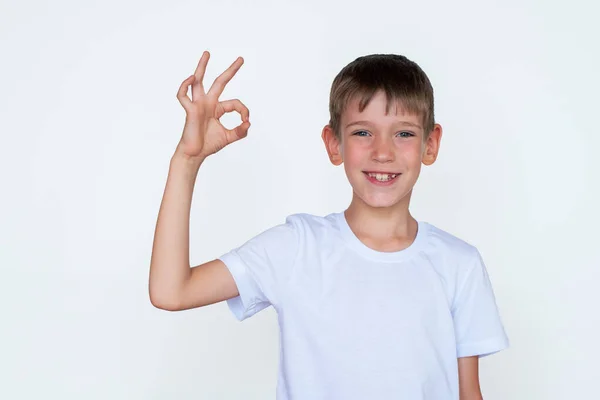 Portrait Cute Caucasian Boy Showing Gesture Success Agreement White Background — Stock Photo, Image