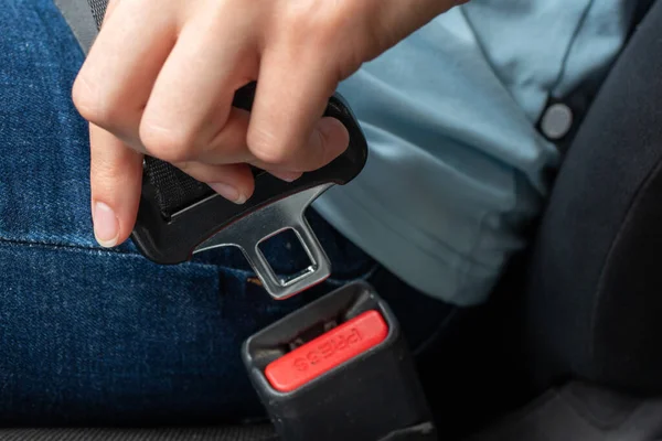 Close Caucasian Female Hand Holding Seat Belt Buckle Fastening Car — Stock Photo, Image