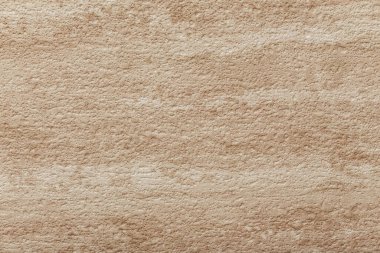 Travertin bej taş dokusu. Yarı kumlu yüzey. Arkaplan tasarımı.