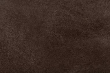 Koyu kahverengi taş dokusu. Yarı kumlu yüzey. Arkaplan tasarımı.
