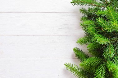 Firavun beyaz ahşap arka planda sınır çiziyor. Noel çerçevesinin en üst görüntüsü, metin ya da ürün için yer. Yakın plan, Noel yatağı.