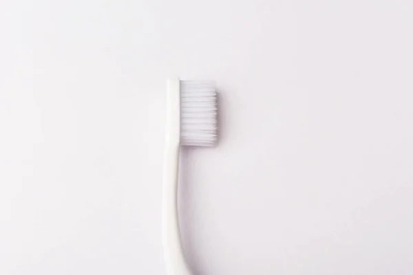 White toothbrush isolated on white background. — Stock Photo, Image