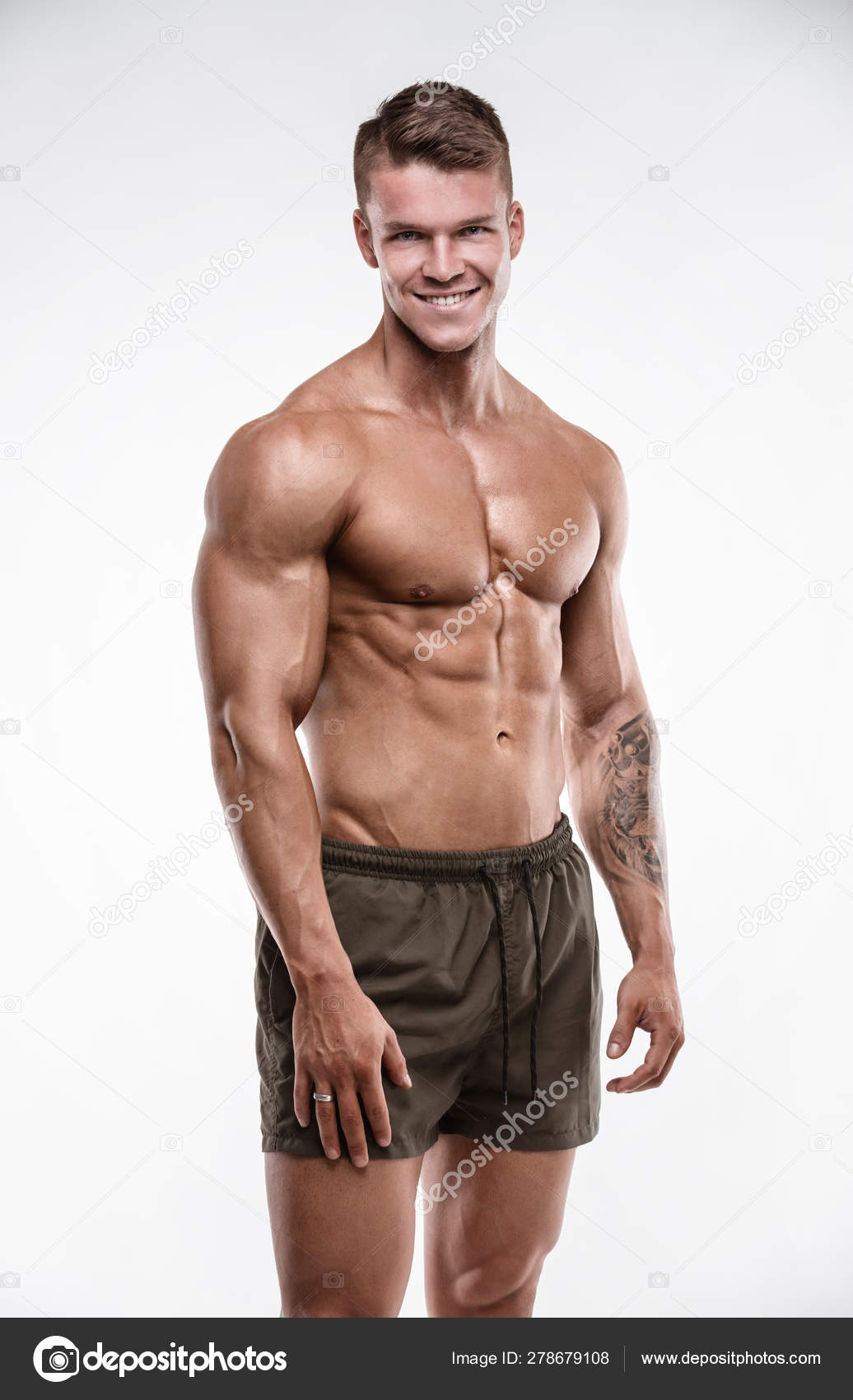 Strong Athletic Man shows body Stock Photo by ©_italo_ 278679108