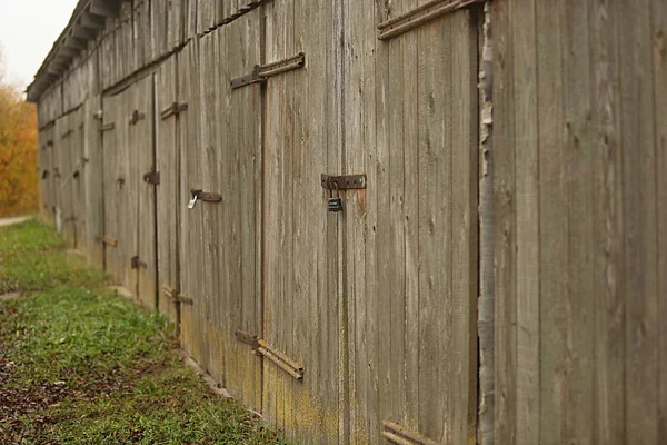 Old weathered wooden closed door — Stock Photo, Image