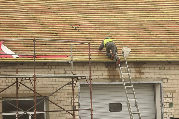 Construction worker on the roof