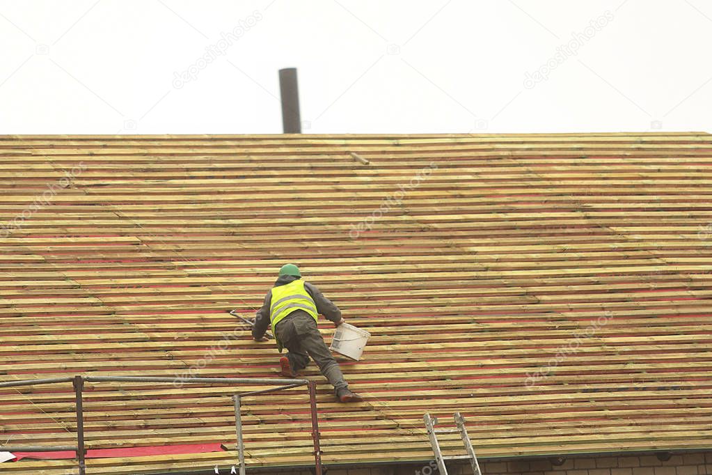 Construction worker on the roof