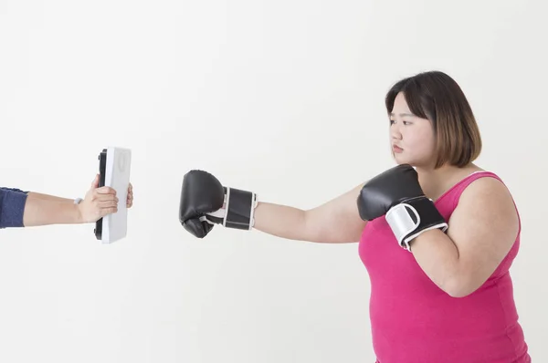 Young Fat Asian Woman Punching Weight Scale — Stock Photo, Image