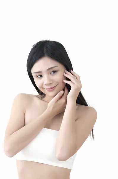 Jovem Mulher Asiática Mãos Seu Rosto Sorrindo Olhando Para Longe — Fotografia de Stock