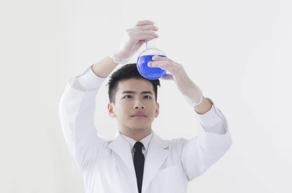 Young Asian Biologist Holding Test Tube Looking — Stock Photo, Image