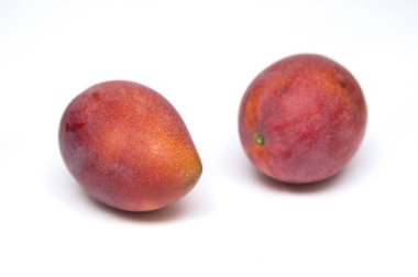 lezzetli mango meyve arka plan üzerinde Kapat 