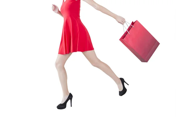 Mujer Joven Con Vestido Rojo Sosteniendo Una Bolsa Corriendo —  Fotos de Stock