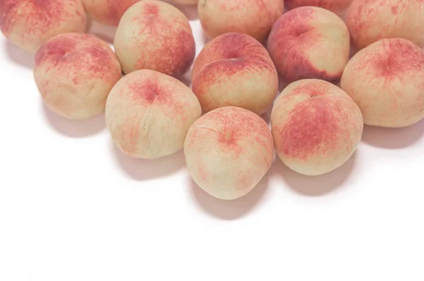fresh,tasty peaches on background,close up