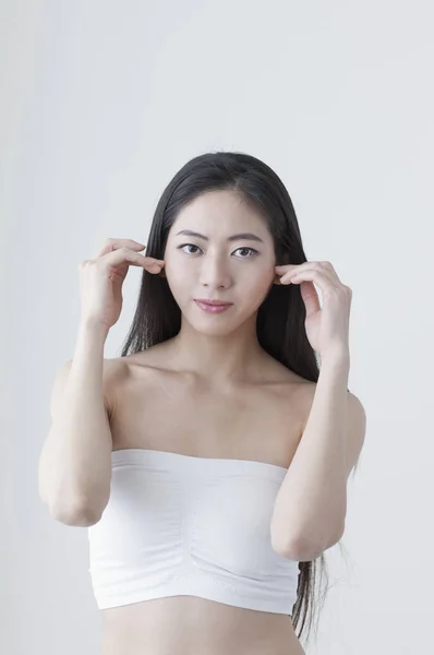 Beautiful Asian Woman Hands Her Face Looking Camera — Stock Photo, Image