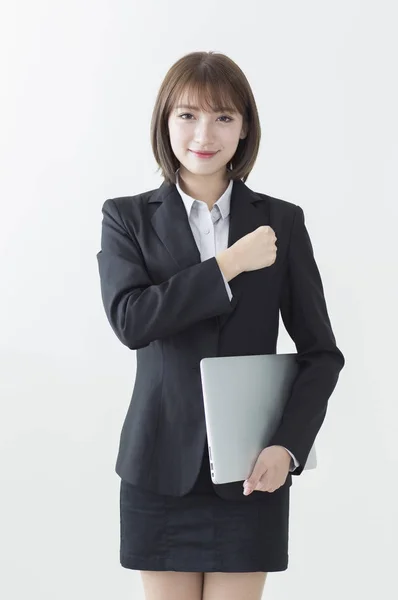 Young Asian Woman Wearing Suit Hands Her Chest Smiling Camera — Stock Photo, Image