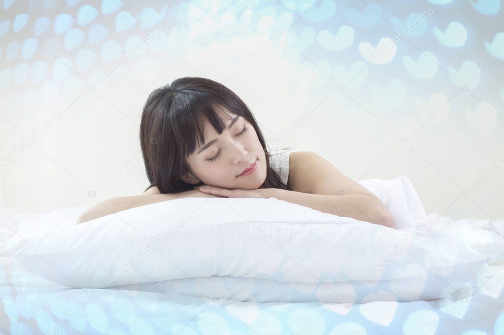 Asian female woman sleeping over blue background