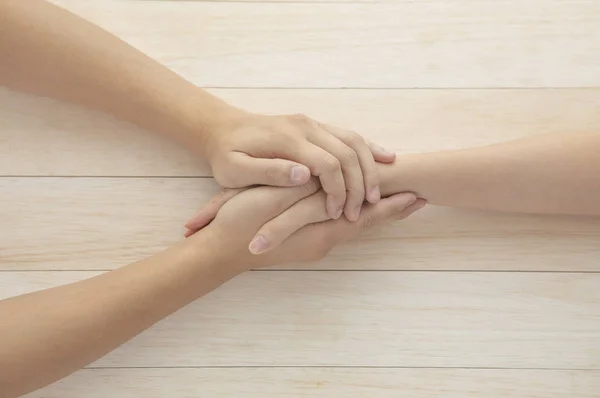 Man Woman Holding Hands Together Wooden Background —  Fotos de Stock