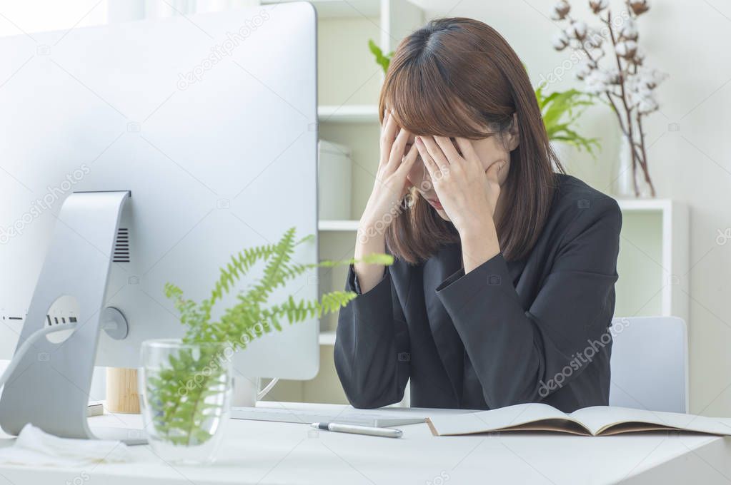 Asian business woman feel stress from work. 
