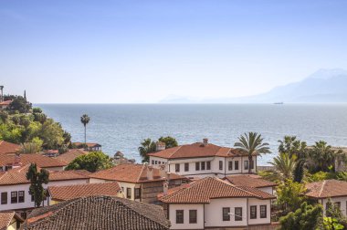 view of the sea and red roofs, Mediterranean architecture