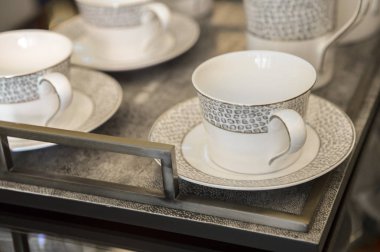 empty white ceramic cups on table 